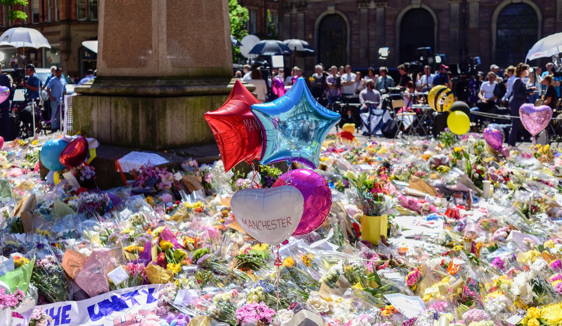 Flowers, balloons and messages left in Manchester after the Manchester Arena attack in May 2017.